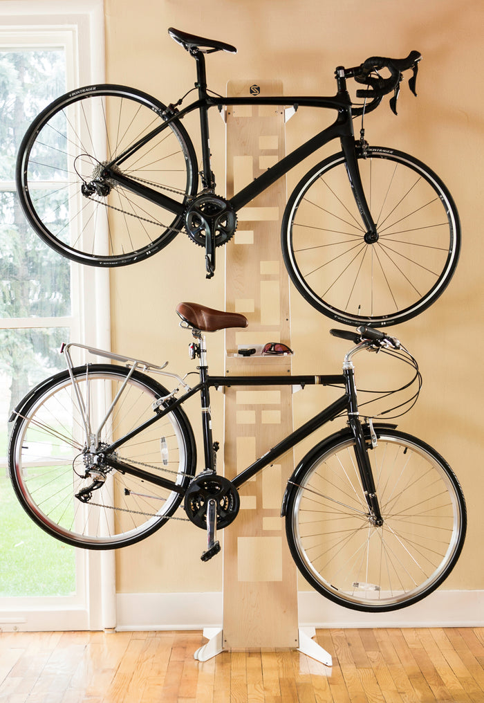 Saris Hottie 2-Bike Storage Stand — walnut wood and steel V-frame construction