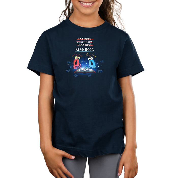 Premium Cotton T-shirt_TeeTurtle navy The Martians Read Book Premium Cotton T-shirt featuring the red and blue yip yip martians from Sesame Street in a classic moment where they are trying to figure out what to do with a book that is open in front of them. Text above them reads "Eat Book," "Smell Book," and "Hear Book" with all of them crossed out and "Read Book" underneath. They are surrounded by the word "yip."