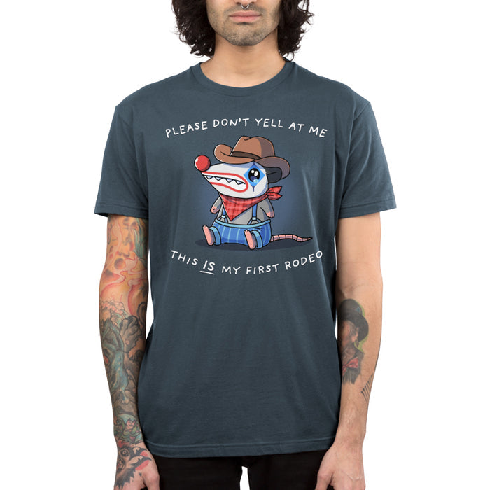 Premium Cotton T-shirt_TeeTurtle denim blue This Is My First Rodeo apparel featuring a sad opossum wearing a rodeo clown costume with the caption, “Please Don’t Yell At Me, This IS My First Rodeo“.
