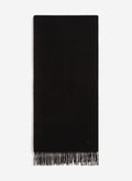 The Percival Tolkein Scarf in black wool, featuring fringed ends and tonal embroidery, laid flat against a white background.