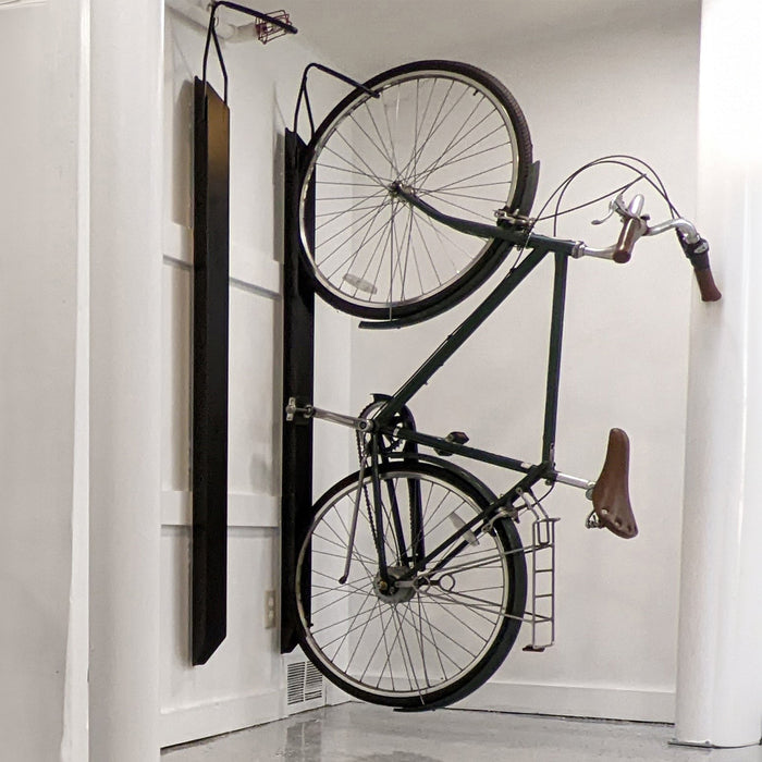 Saris Universal Bike Trac Vertical Storage — floor-to-ceiling clamping storage system