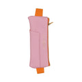 Pink vegan leather pen pouch with orange elastic strap and top zipper
