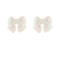White acrylic bow stud earrings with a subtle iridescent sheen and gold-dipped accents on a white background from The Pink Doxie Boutique.