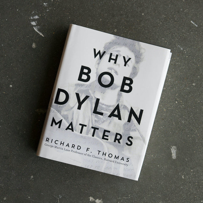 Book titled "Why Bob Dylan Matters" by Richard F. Thomas, white cover with bold black type